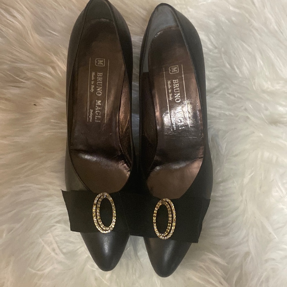 Bruno Magli Size AA black shoes with gold rhinestones and a bow in front